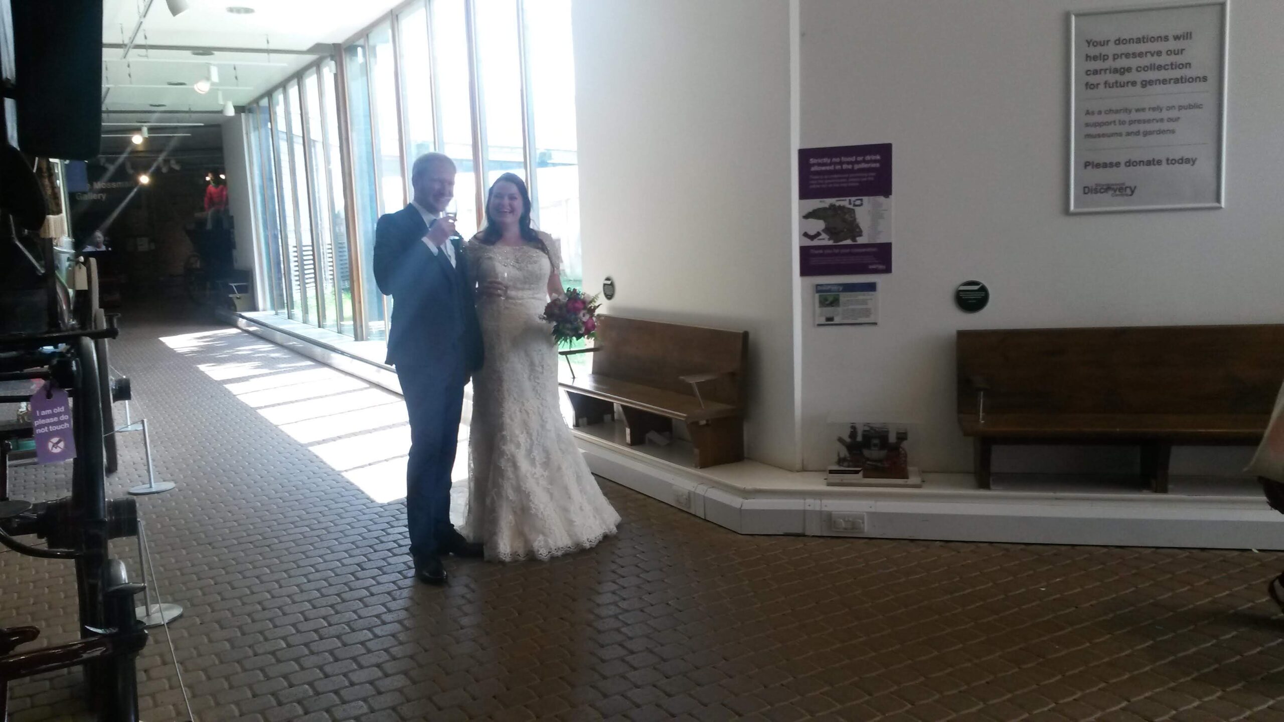 Couple walking down the hall of their venue